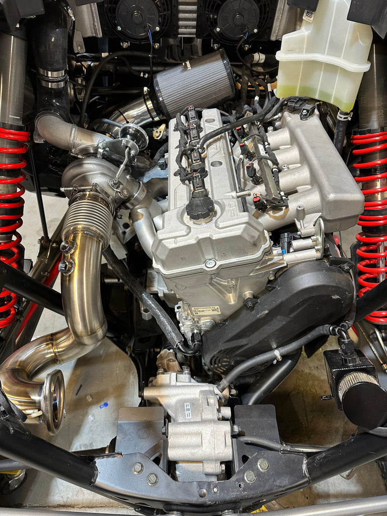 Polaris RZR Pro R Thumper 2.0 Pump Gas Low Boost Turbocharger Kit installation view.