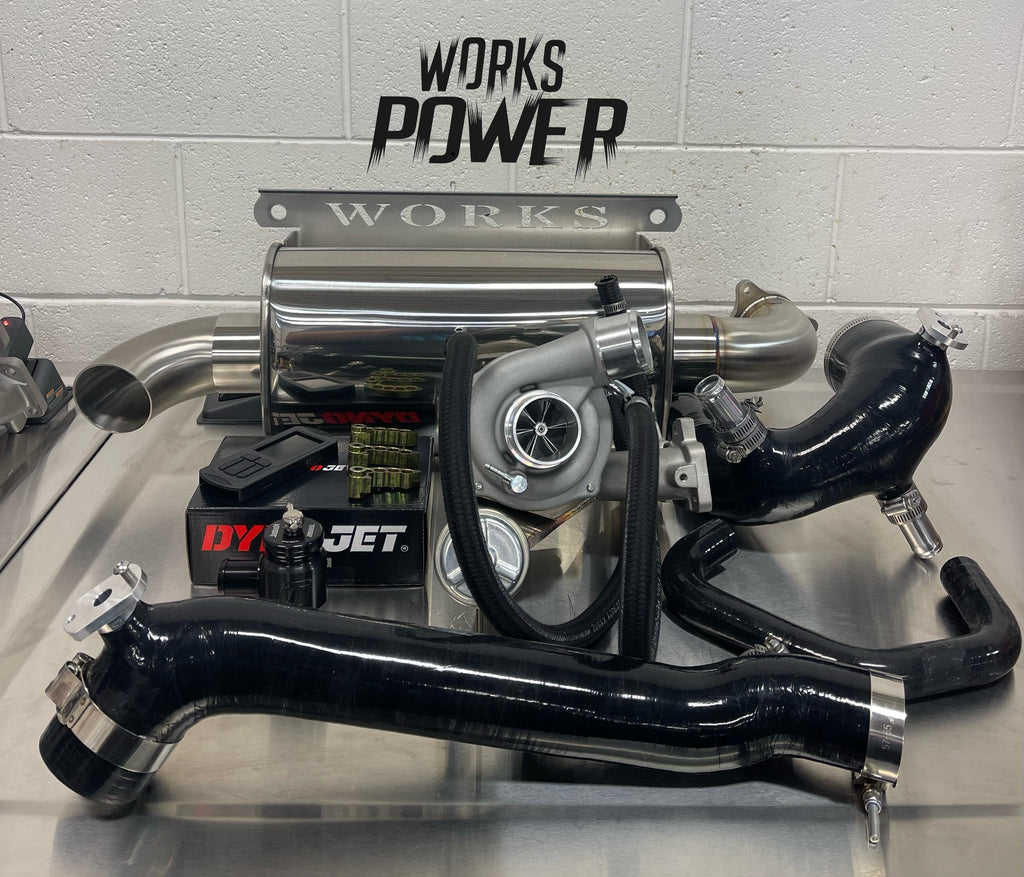 WORKS POWER WATER COOLED FACTORY BIG TURBO KIT with performance parts for UTVs on display